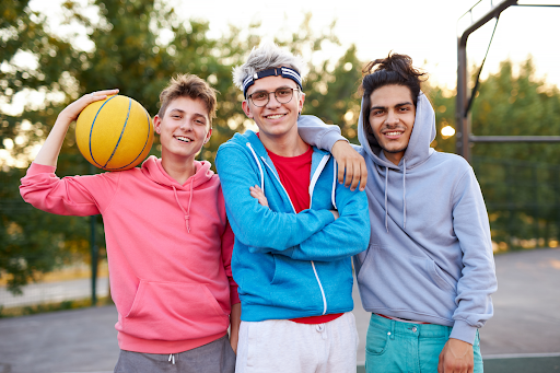 young adults on basketball court